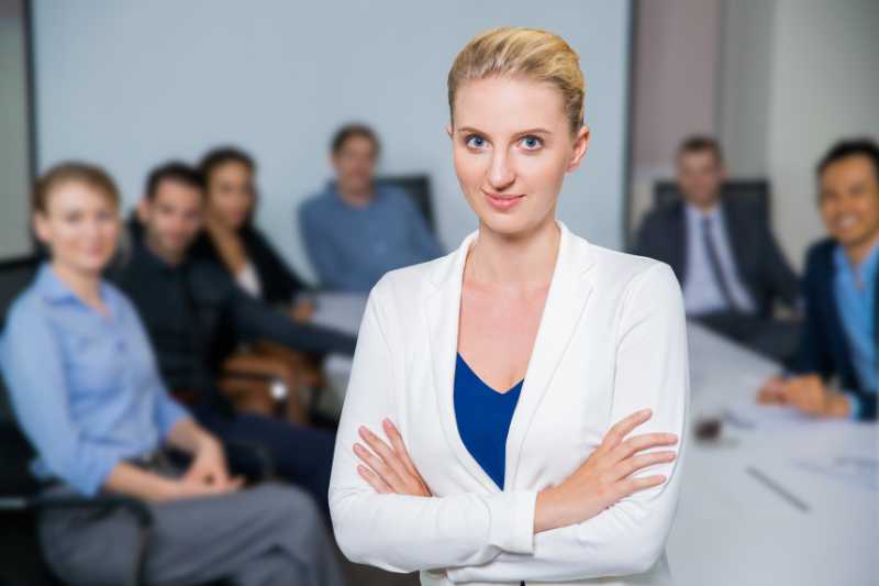 A Young Female Executive In The Boardroom